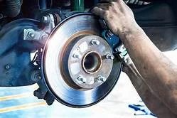 Why do my brakes make noise at low speed?