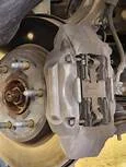 Why do my brakes squeak at high speed?